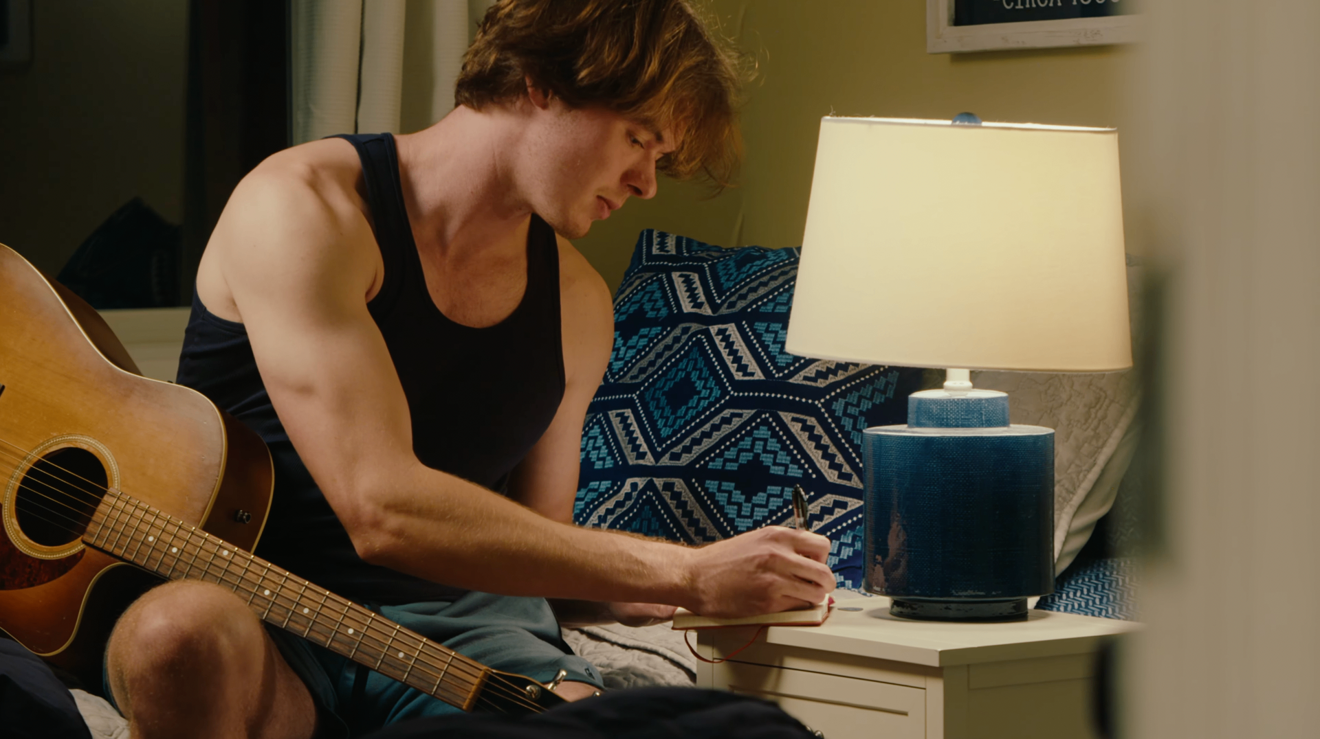 Songwriter at home — still from Dewey Days